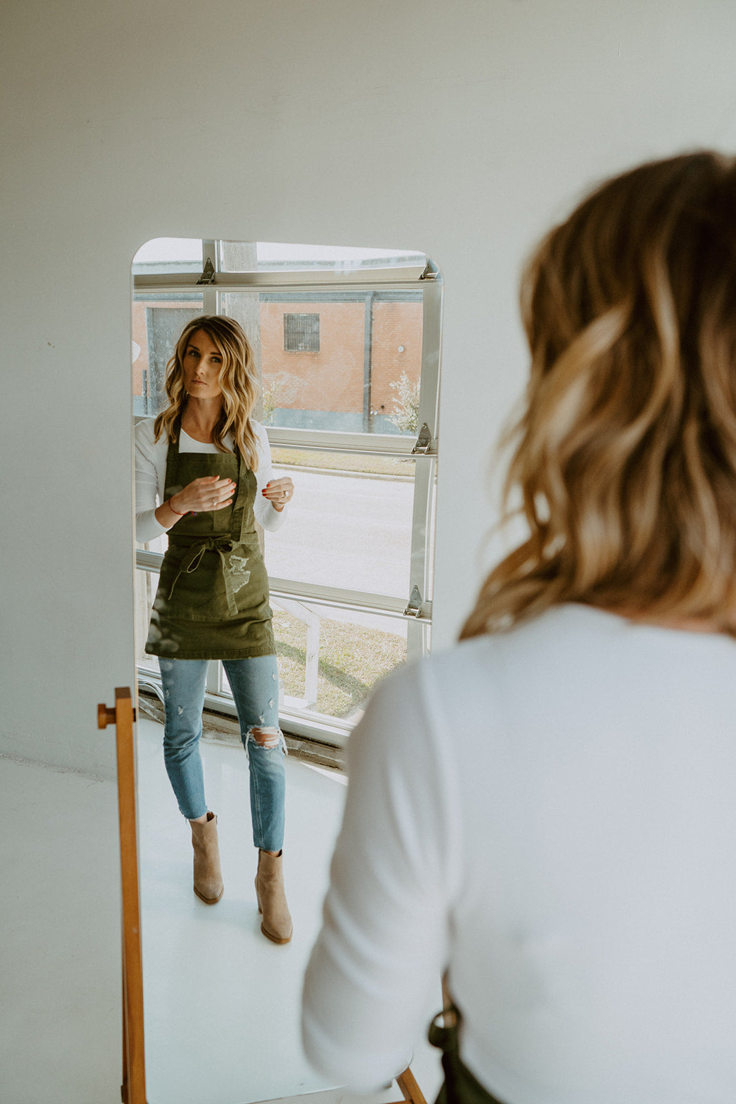 J. Clark Designed aprons lifestyle mirror shot