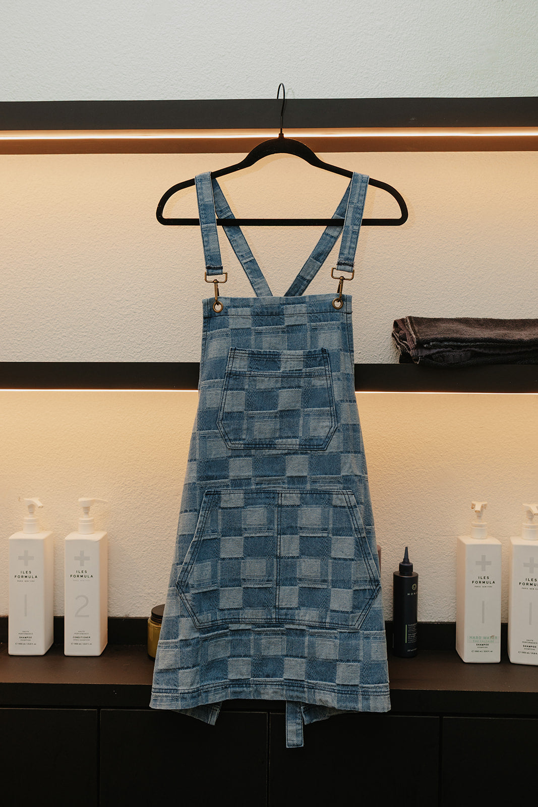 The Whitmore apron by J Clark Designed displayed on a hanger