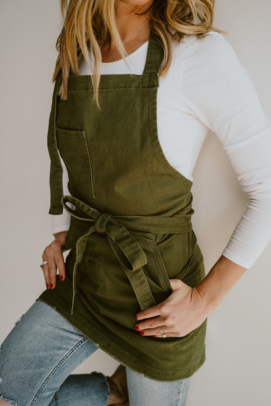 Olive green apron by J Clark Designed close-up pocket detail