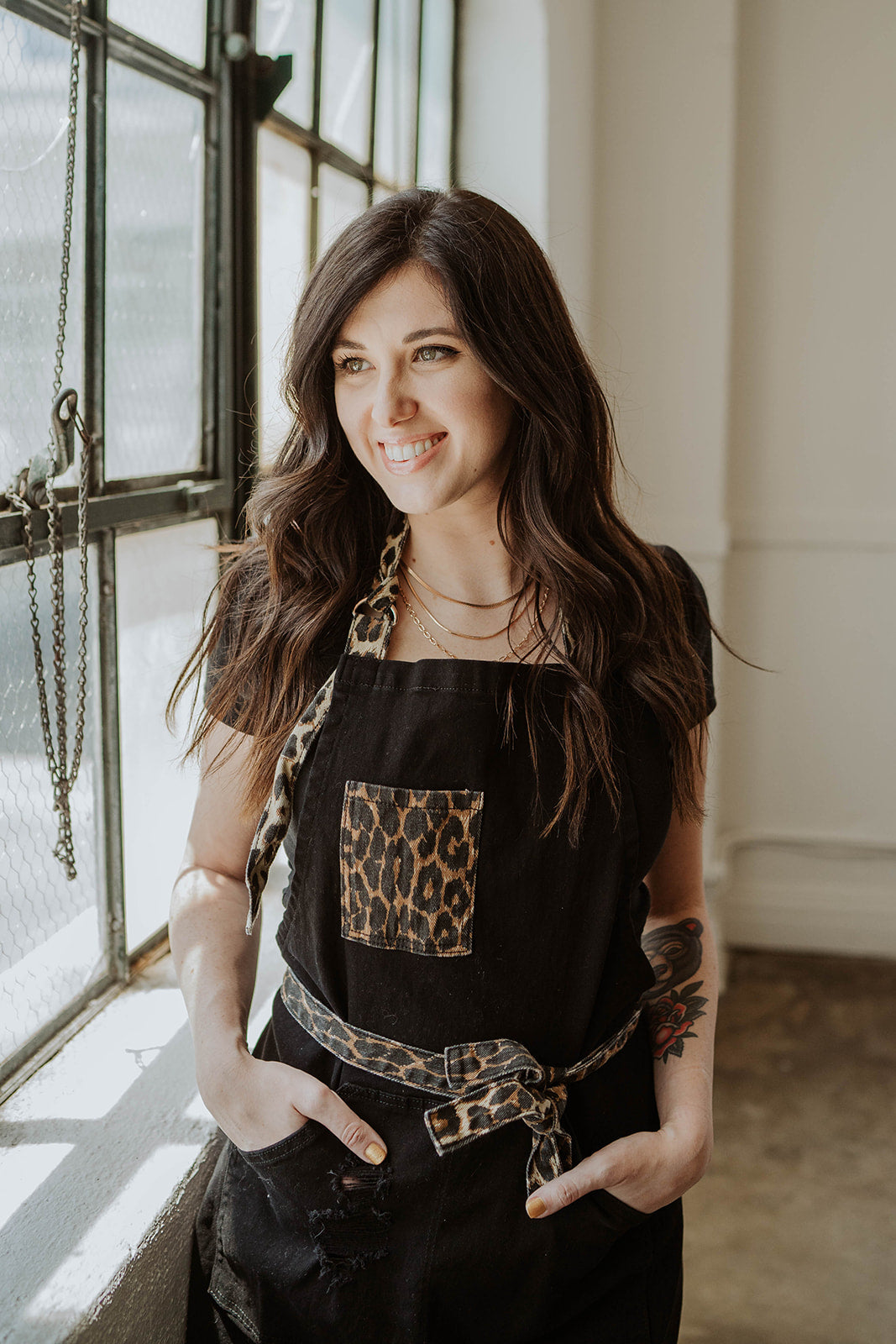 Female model wearing leopard two tone apron