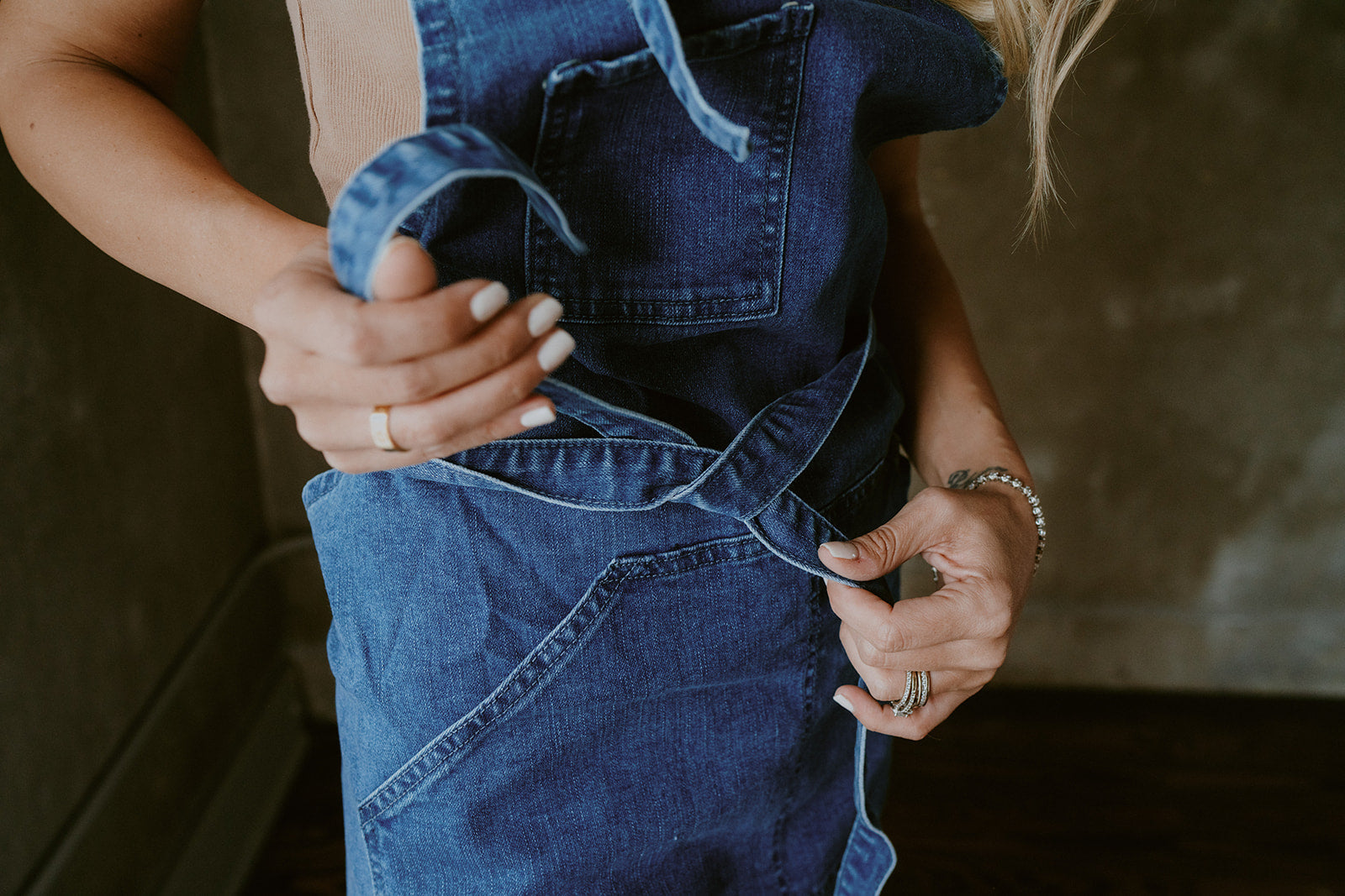 Denim apron pocket detail close-up