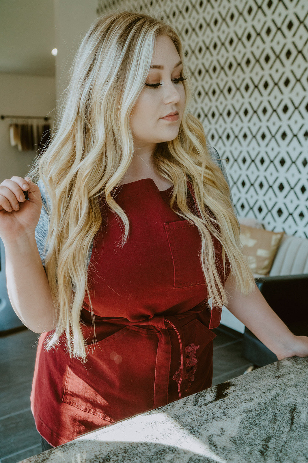 Cranberry lush apron on model